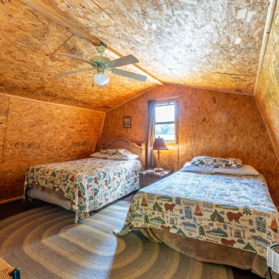 Loft of one of our cabins with two beds